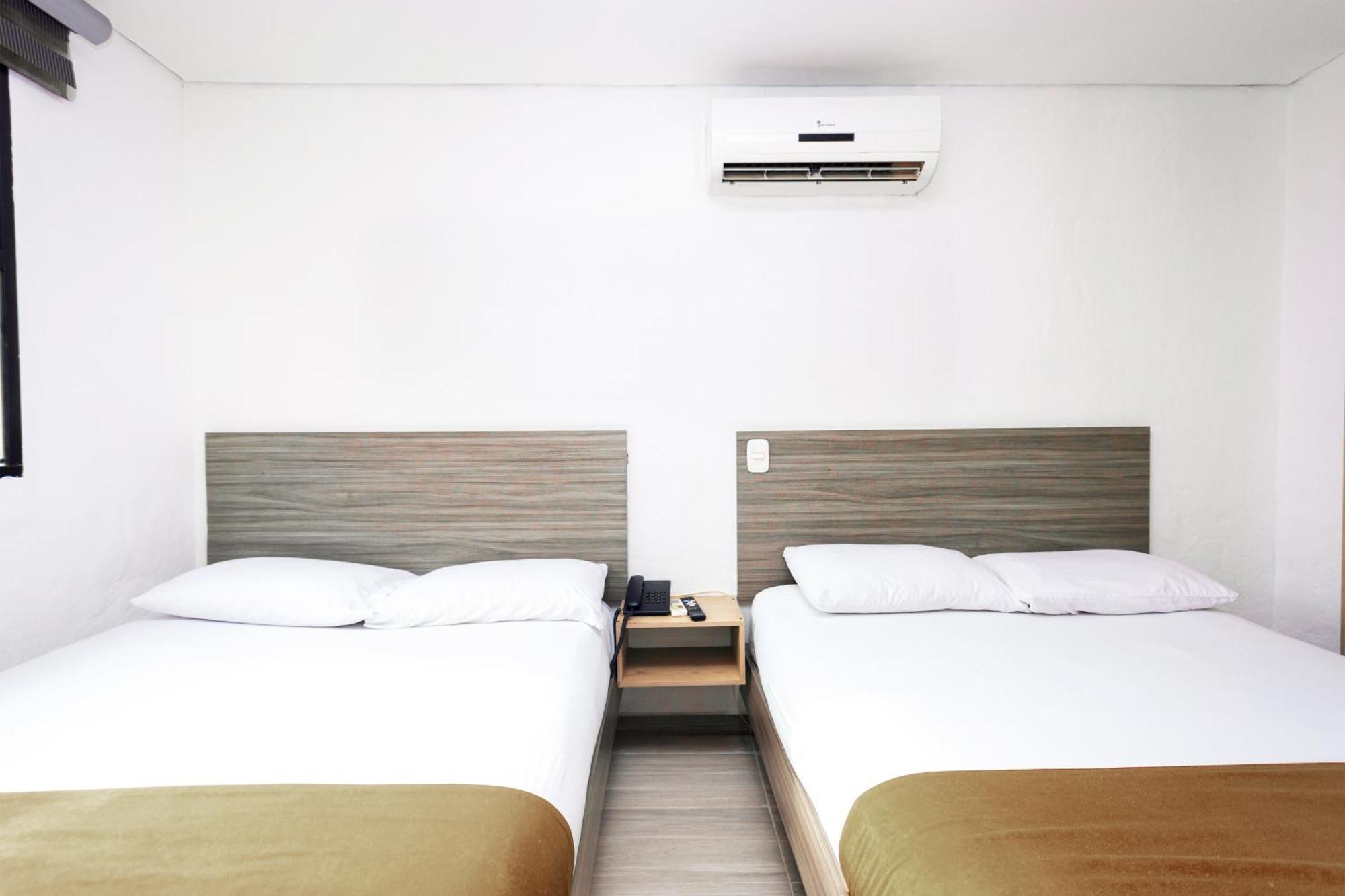 Novus Laureles Hotel